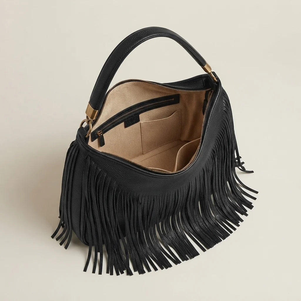 Interior lining and pockets of Black slouchy fringe bag