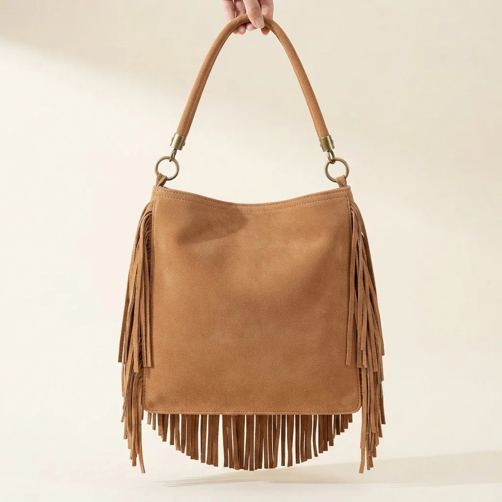 Back panel of Brown slouchy fringe bag with strap attachments