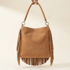 Back panel of Brown slouchy fringe bag with strap attachments