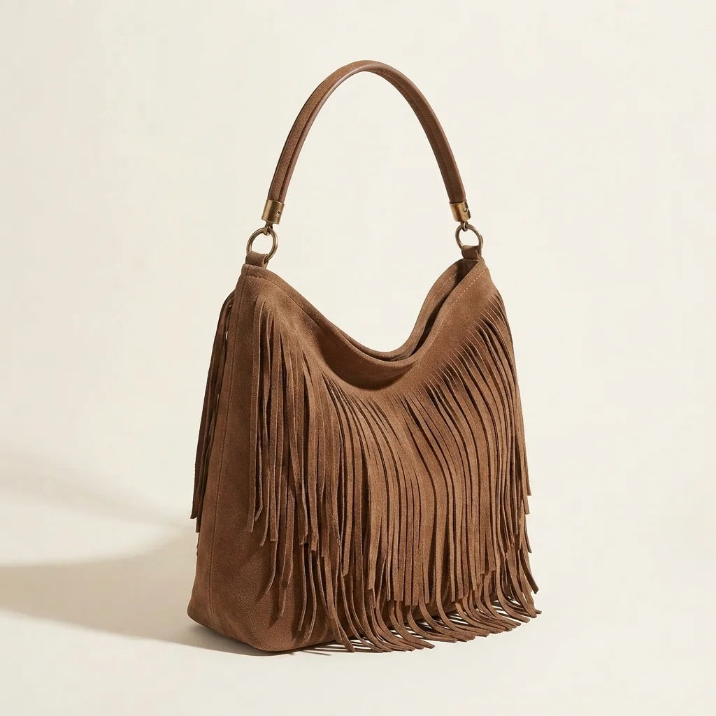 Brown slouchy fringe bag, three-quarter angle showing side depth