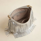 Interior lining and pockets of Silver slouchy fringe bag
