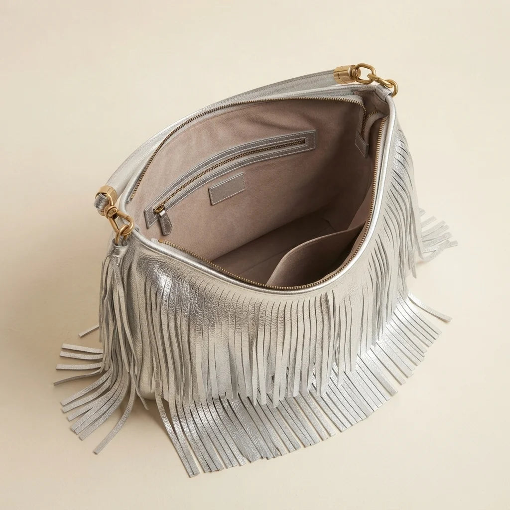 Interior lining and pockets of Silver slouchy fringe bag