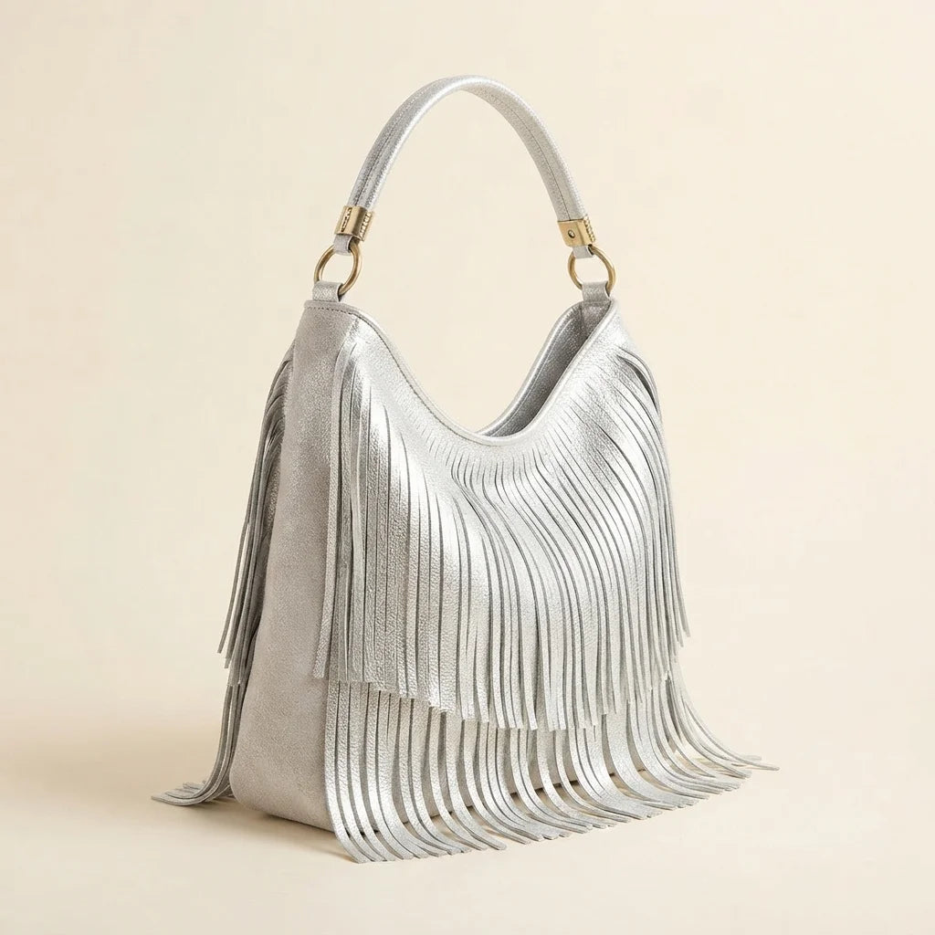 Silver slouchy fringe bag, three-quarter angle showing side depth