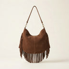 Back panel of Brown small brown fringe bag with strap attachments