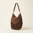 Brown small brown fringe bag, three-quarter angle showing side depth