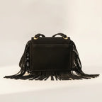 Back panel of Black small fringe bag with strap attachments