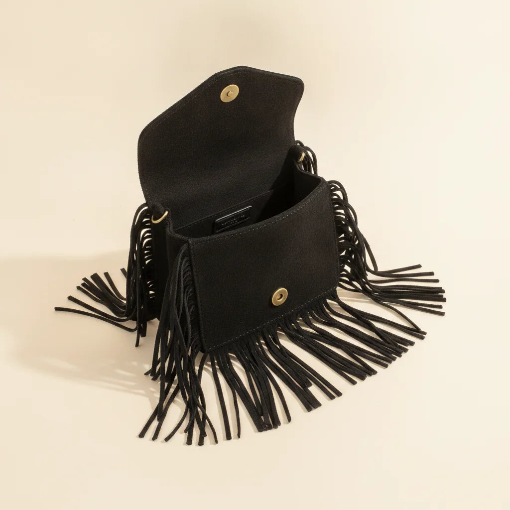 Interior lining and pockets of Black small fringe bag