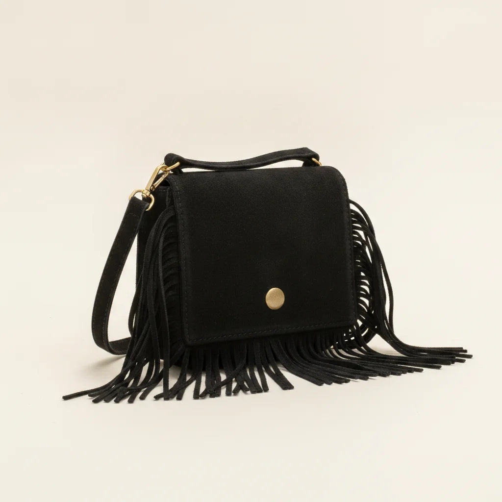 Black small fringe bag, three-quarter angle showing side depth
