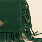 Close-up of fringe stitching and texture on Green small fringe bag