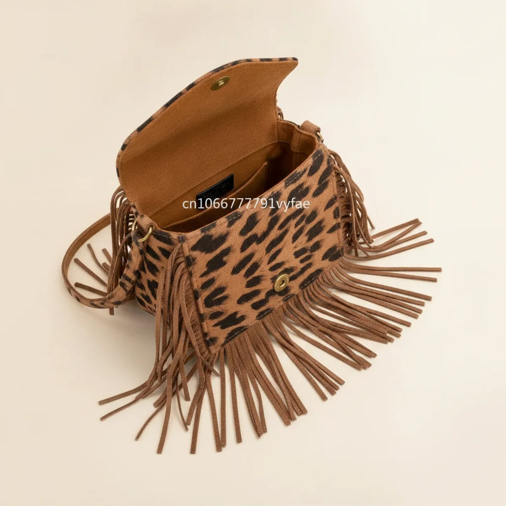Interior lining and pockets of Leopard small fringe bag