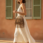 Woman wearing Leopard small fringe bag with swaying fringe