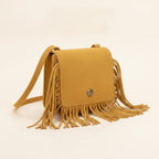 Yellow small fringe bag, three-quarter angle showing side depth