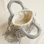 Interior lining and pockets of Silver small fringe bucket bag