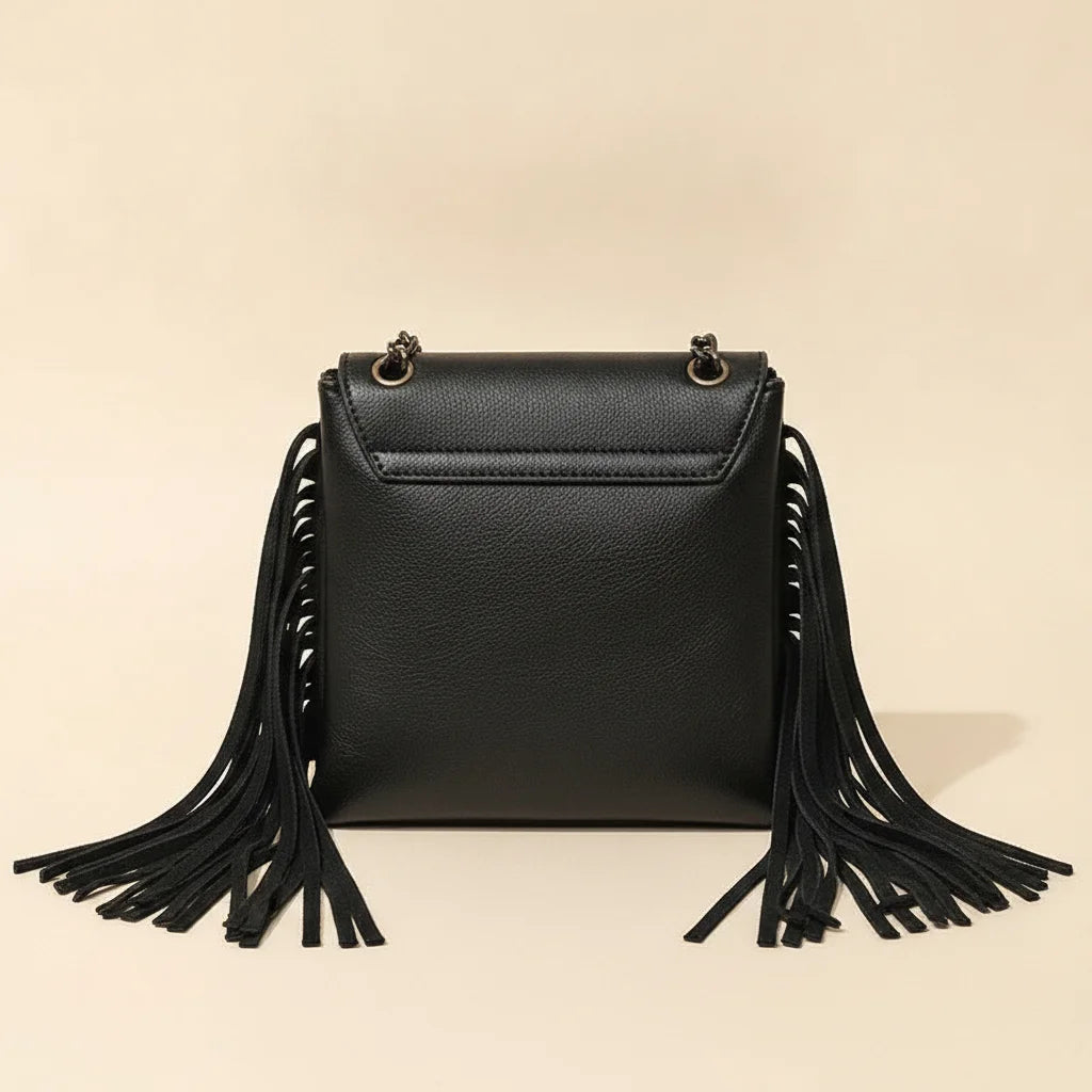 Back panel of Black small fringe crossbody bag with strap attachments