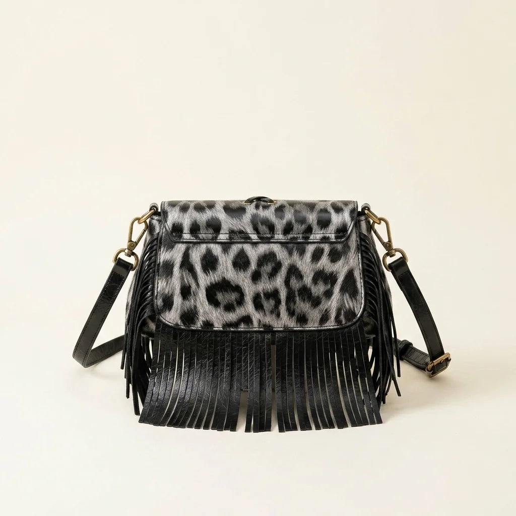 Back panel of Grey small fringe leather crossbody bag with strap attachments