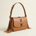 Light Brown small fringe leather crossbody bag, three-quarter angle showing side depth