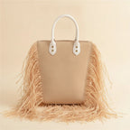 Back panel of Natural small fringe tote bag with strap attachments