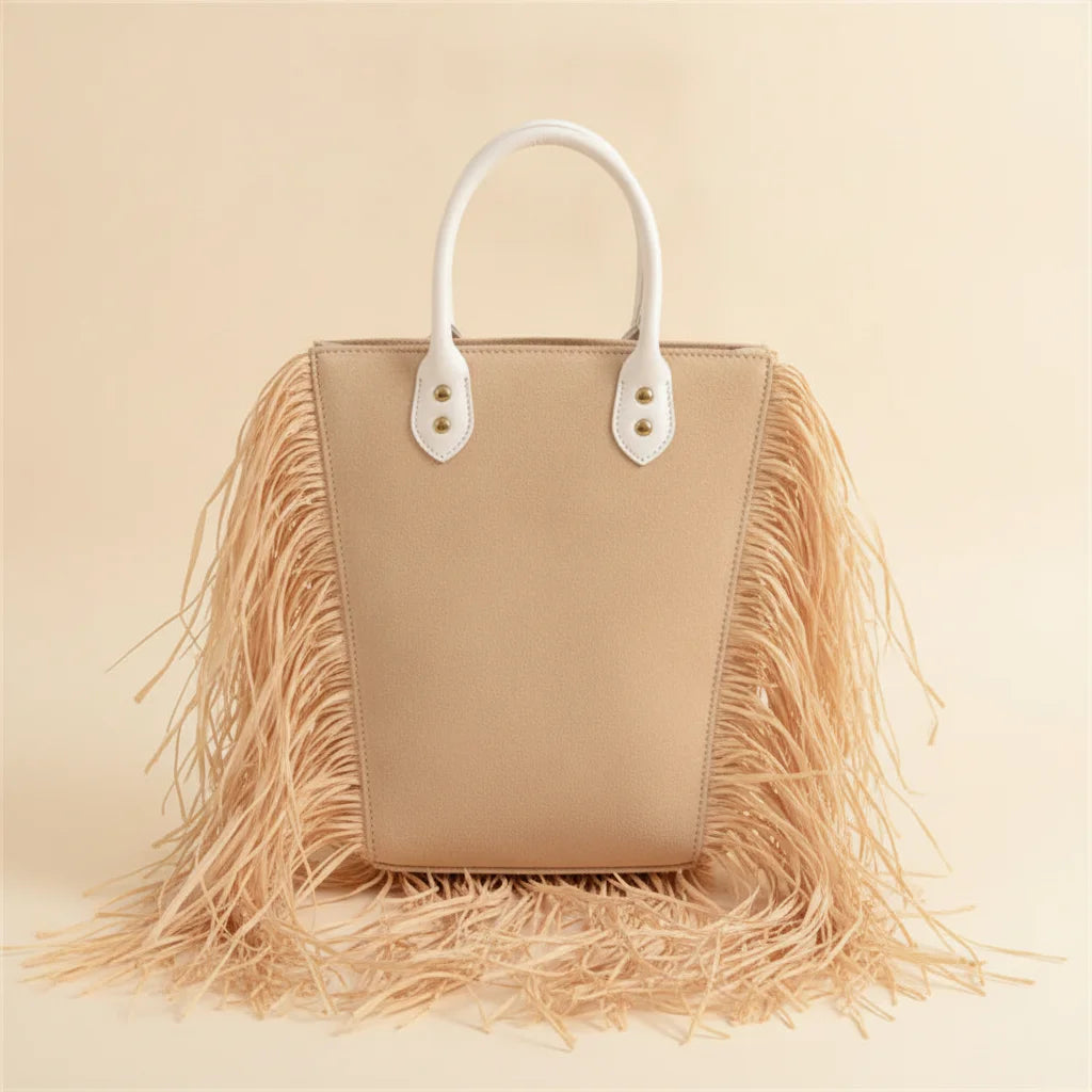 Back panel of Natural small fringe tote bag with strap attachments