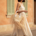 Woman wearing Natural small fringe tote bag with swaying fringe