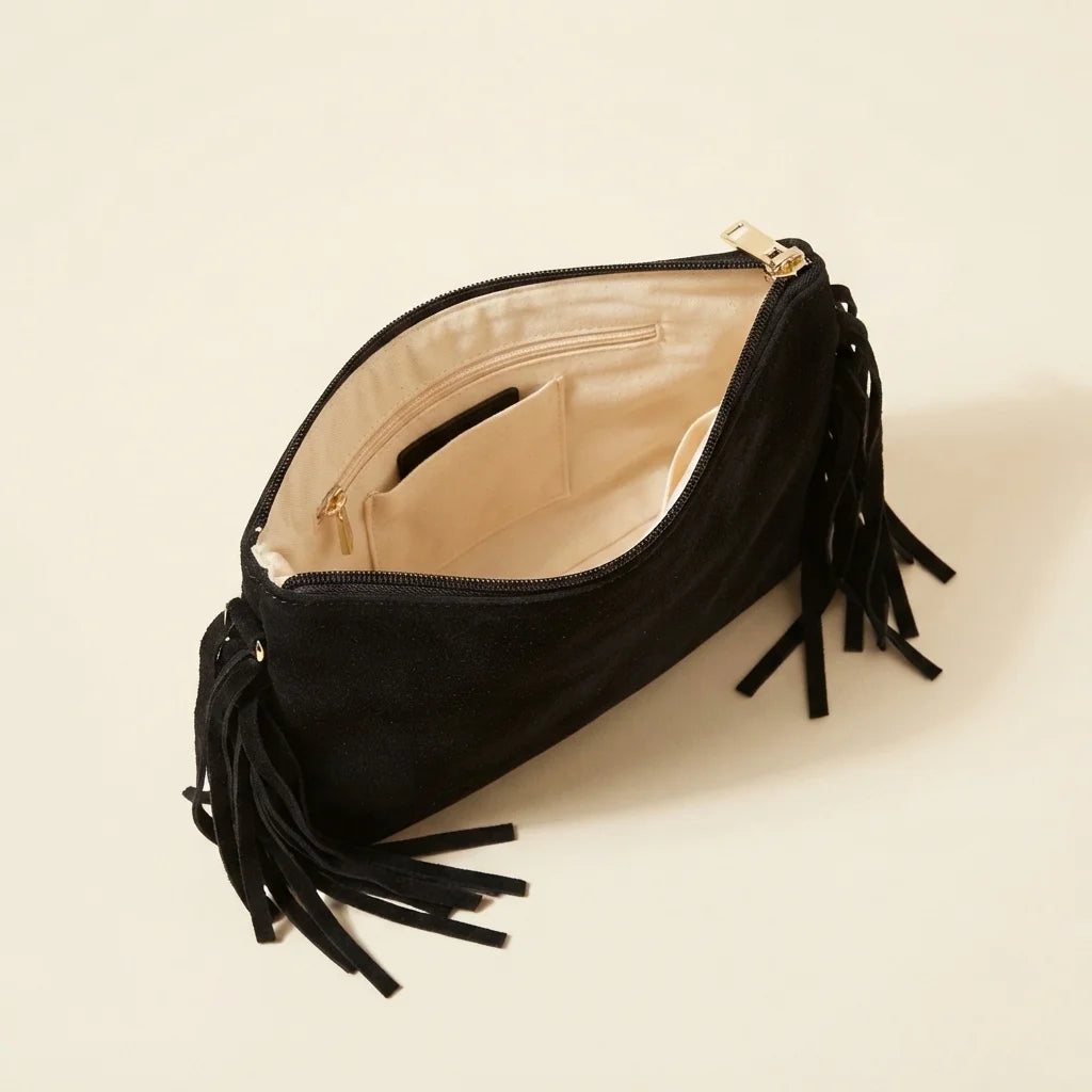 Interior lining and pockets of Black small suede fringe bag