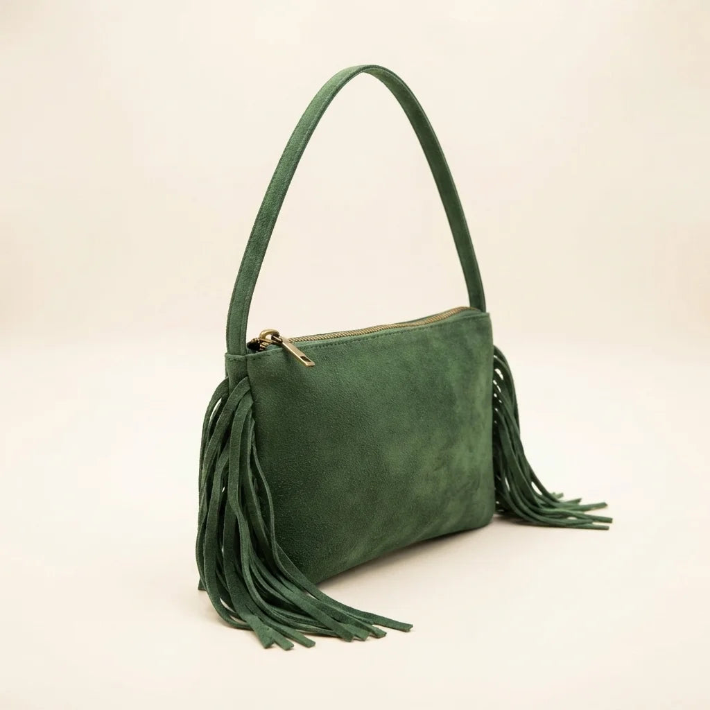 Green small suede fringe bag, three-quarter angle showing side depth