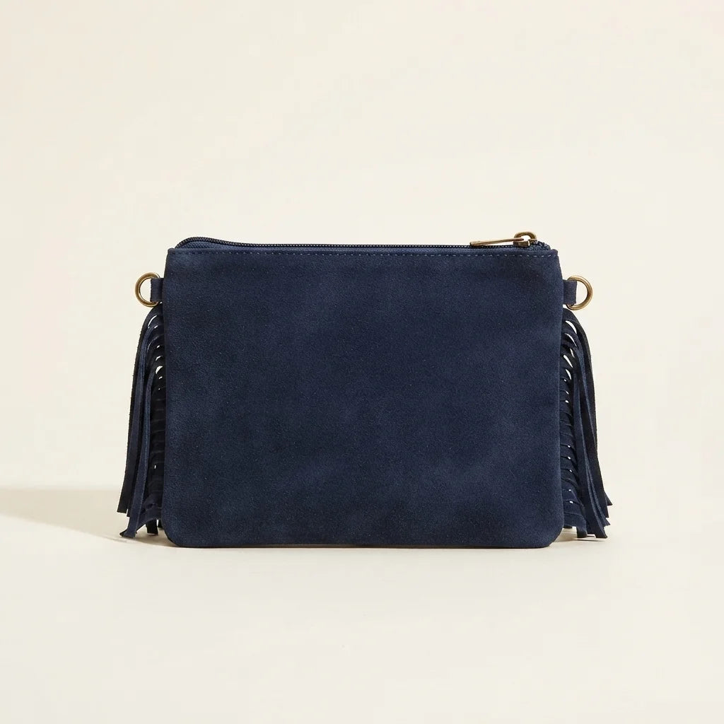 Back panel of Navy small suede fringe bag with strap attachments