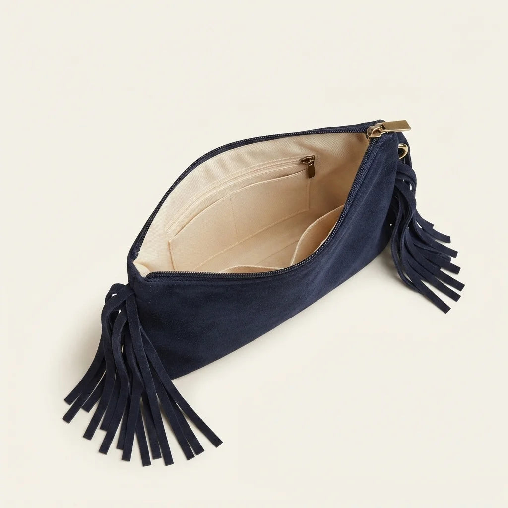 Interior lining and pockets of Navy small suede fringe bag