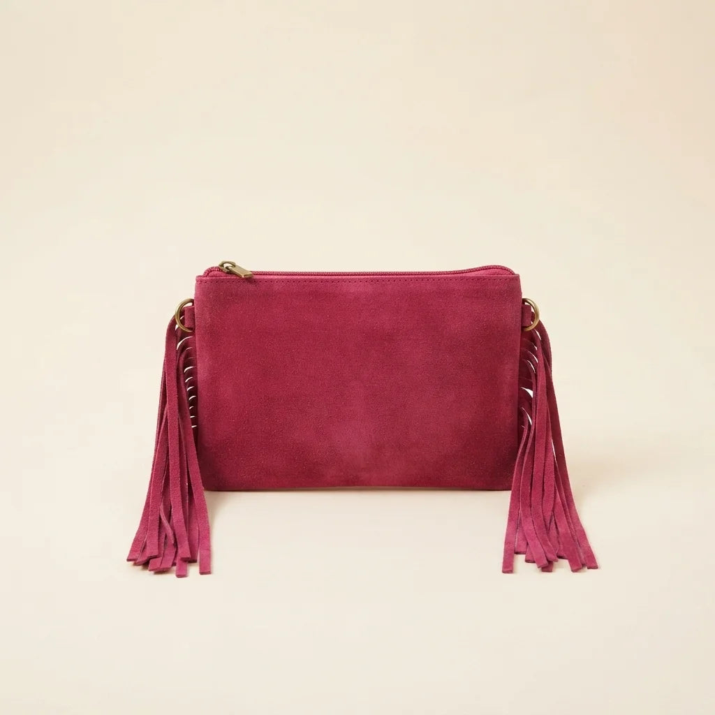 Back panel of Pink small suede fringe bag with strap attachments