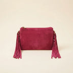 Back panel of Pink small suede fringe bag with strap attachments