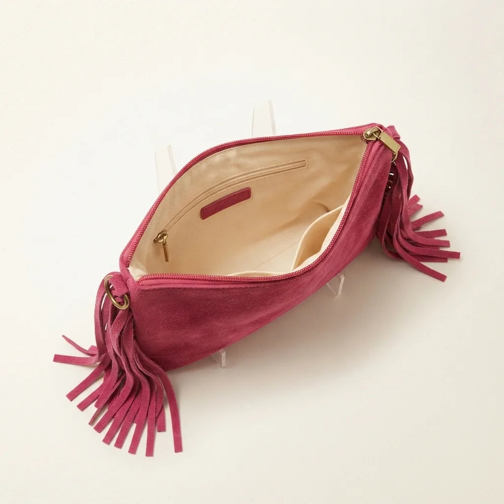 Interior lining and pockets of Pink small suede fringe bag