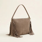 Taupe small suede fringe bag, three-quarter angle showing side depth