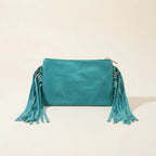 Back panel of Turquoise small suede fringe bag with strap attachments