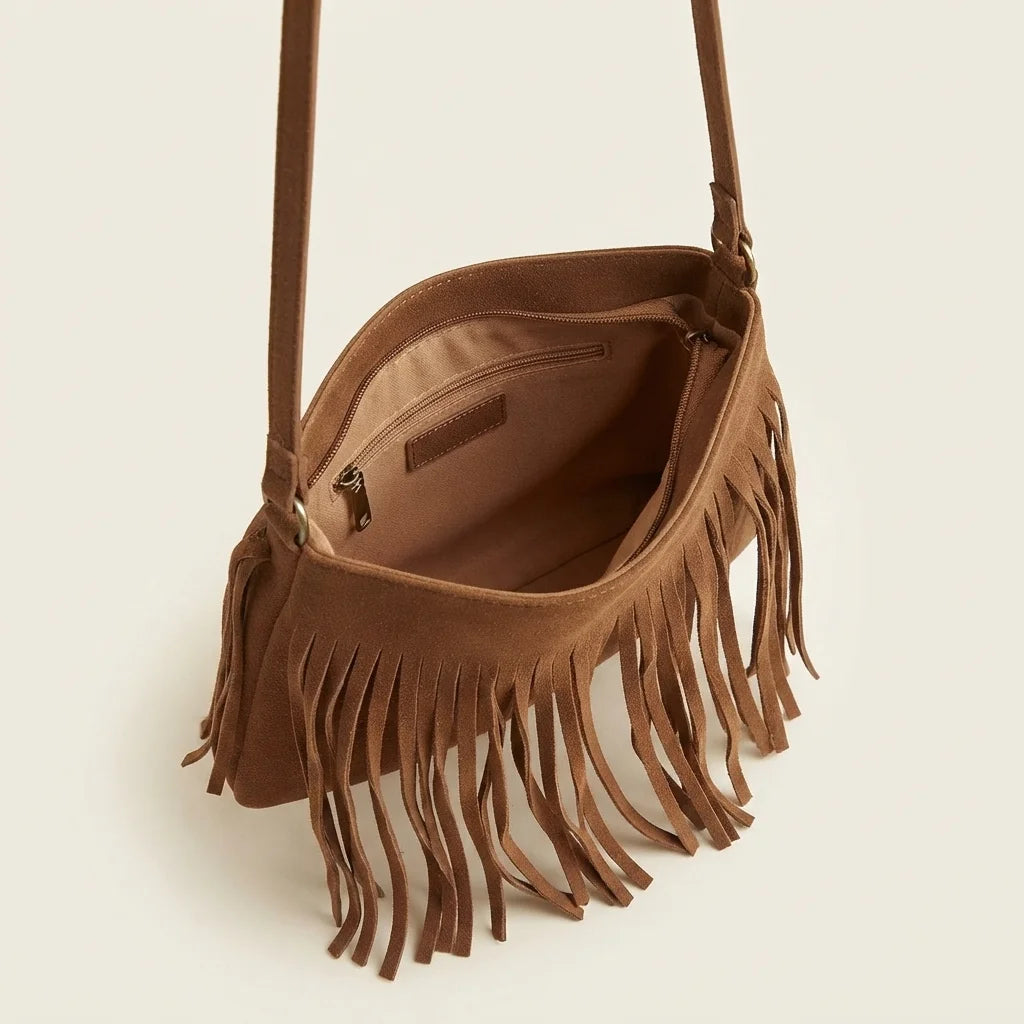 Interior lining and pockets of Brown small tan fringe bag
