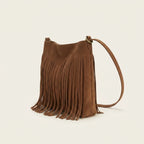 Brown small tan fringe bag, three-quarter angle showing side depth