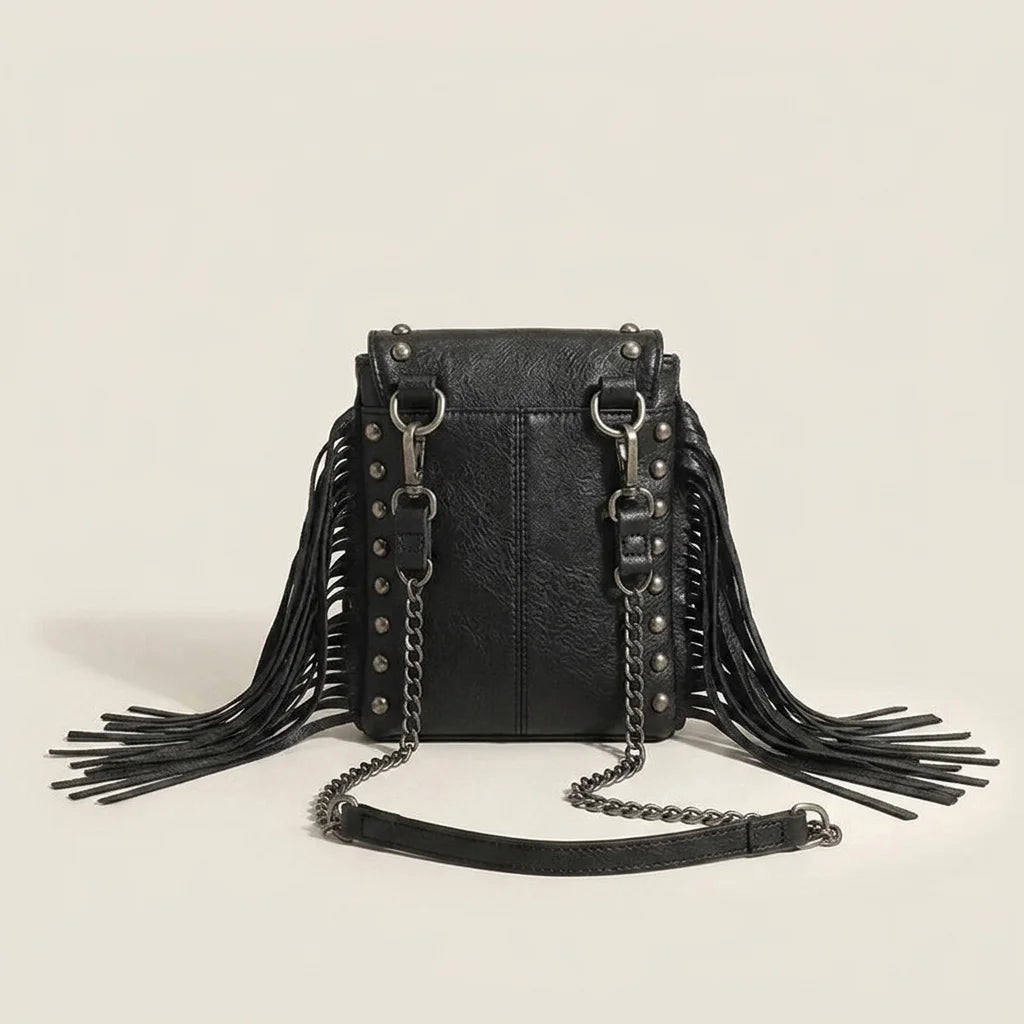 Back panel of Black studded fringe crossbody bag with strap attachments