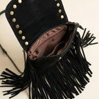 Interior lining and pockets of Black studded fringe crossbody bag