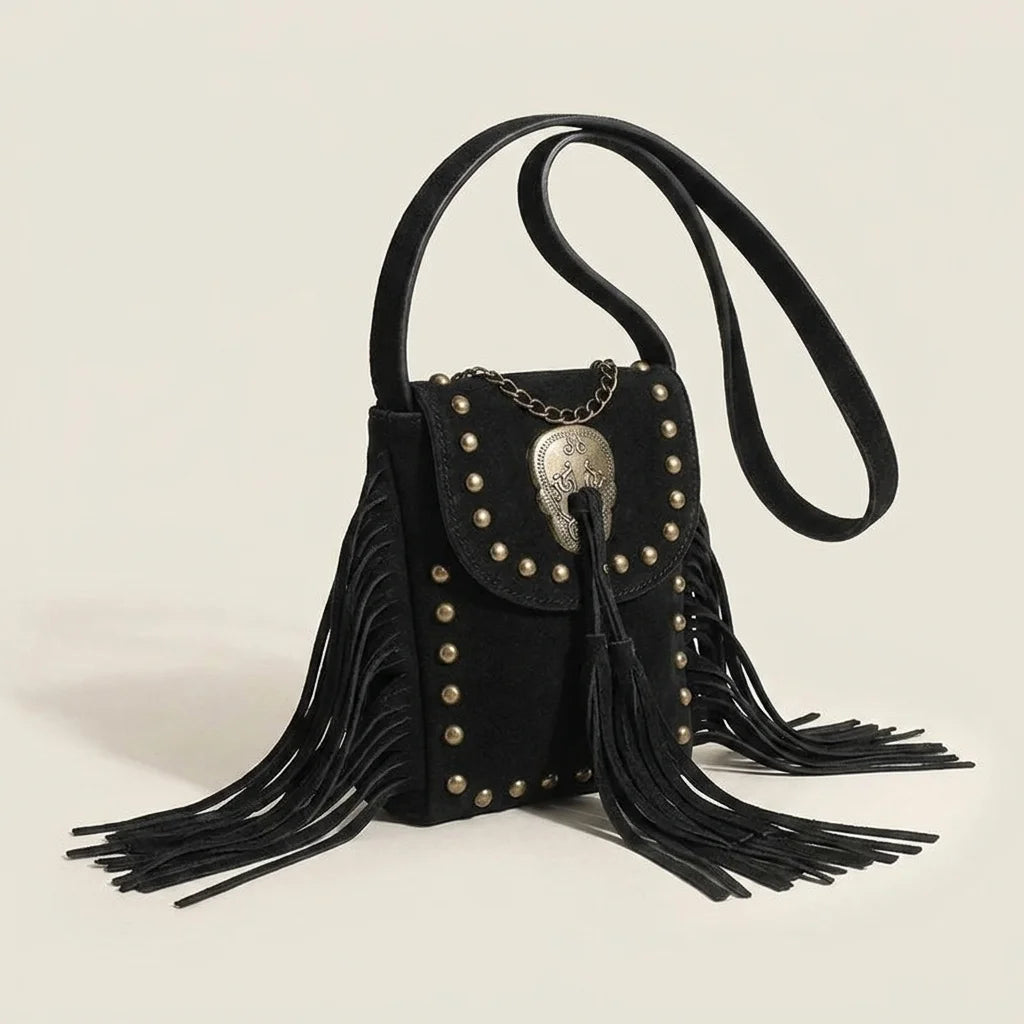 Black studded fringe crossbody bag, three-quarter angle showing side depth