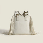 Back panel of White studded fringe crossbody bag with strap attachments