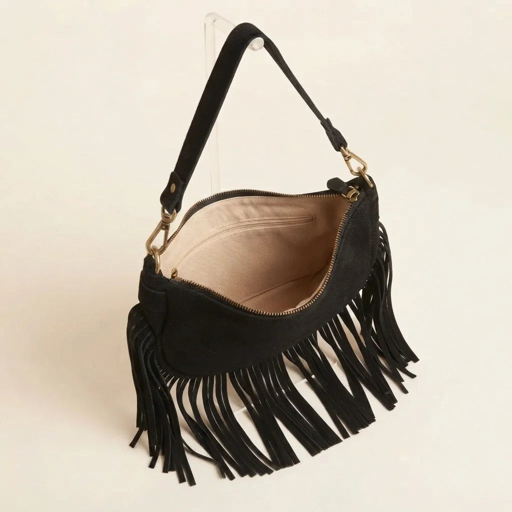 Interior lining and pockets of Black suede fringe clutch bag