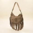 Camel suede fringe clutch bag, three-quarter angle showing side depth