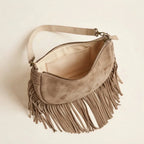 Interior lining and pockets of Taupe suede fringe clutch bag