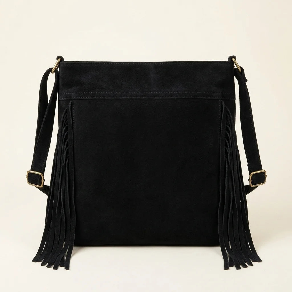 Back panel of Black suede fringe messenger bag with strap attachments