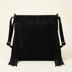 Back panel of Black suede fringe messenger bag with strap attachments