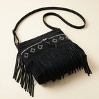 Black suede fringe messenger bag, three-quarter angle showing side depth