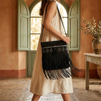 Woman wearing Black suede fringe messenger bag with swaying fringe