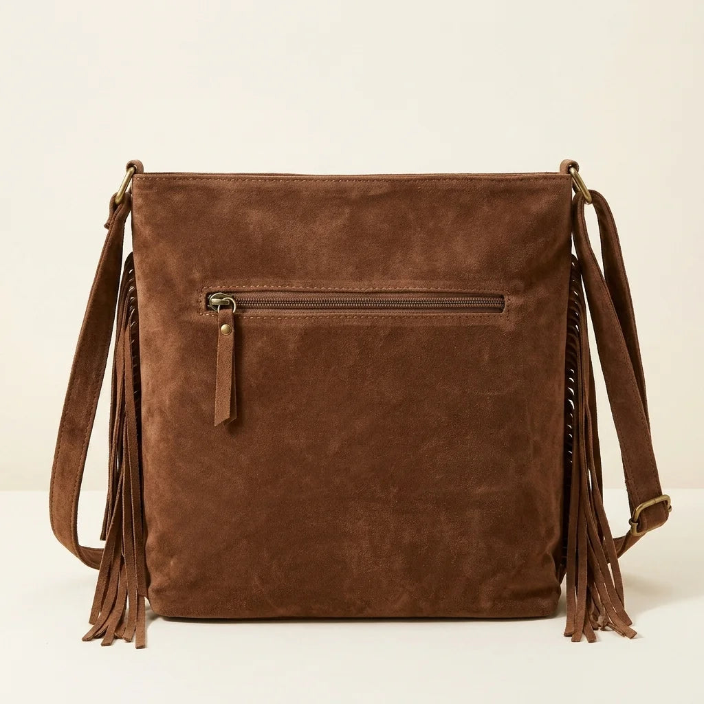 Back panel of Brown suede fringe messenger bag with strap attachments