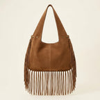 Back panel of Brown suede leather fringe bag with strap attachments