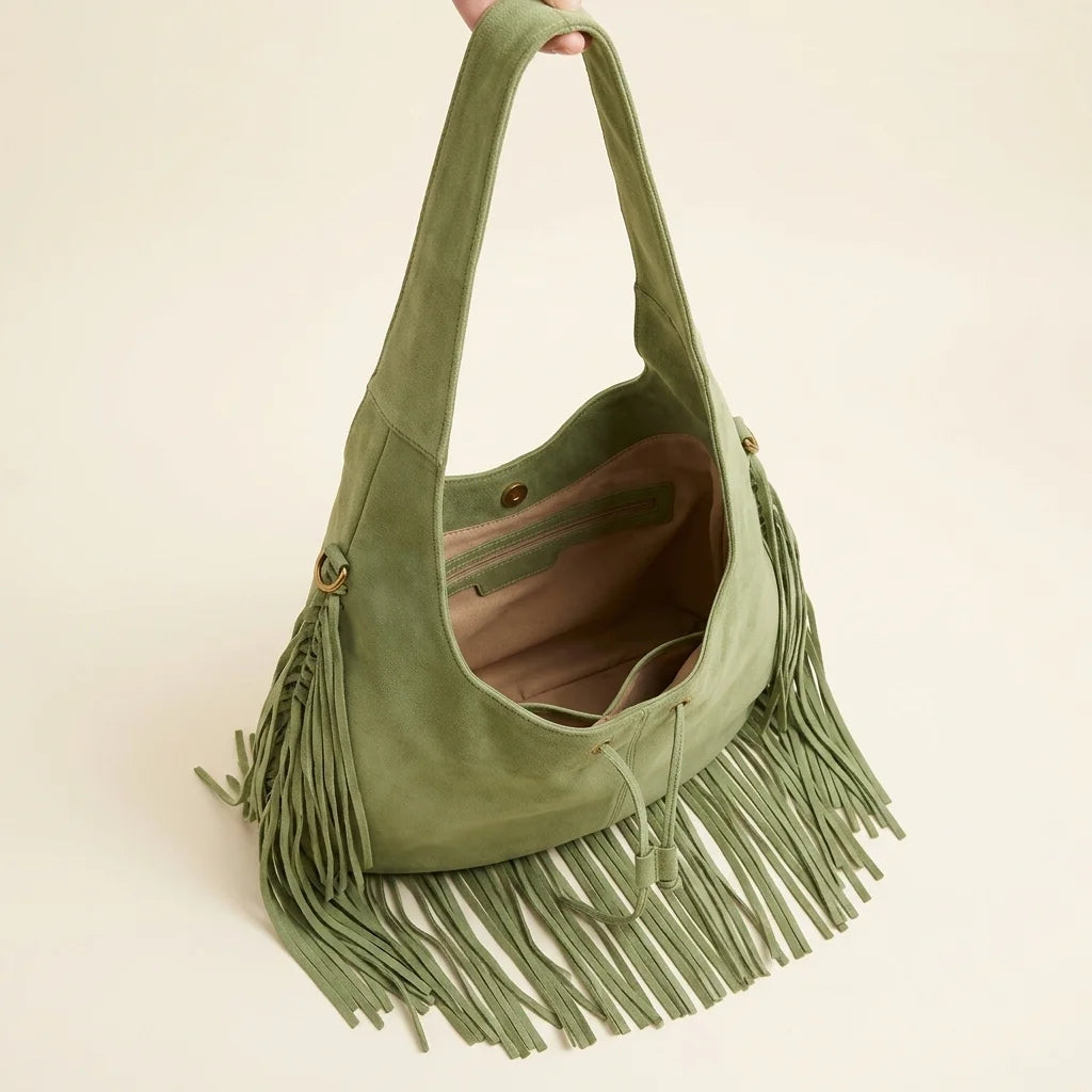 Interior lining and pockets of Green suede leather fringe bag