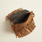 Interior lining and pockets of Brown suede leather fringe crossbody bag