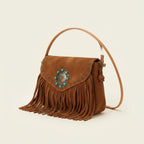 Brown suede leather fringe crossbody bag, three-quarter angle showing side depth
